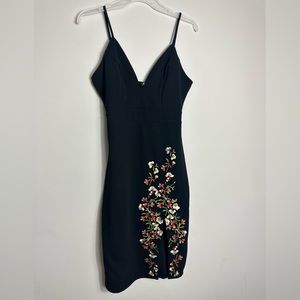 Price firm. Stunning black knee length dress